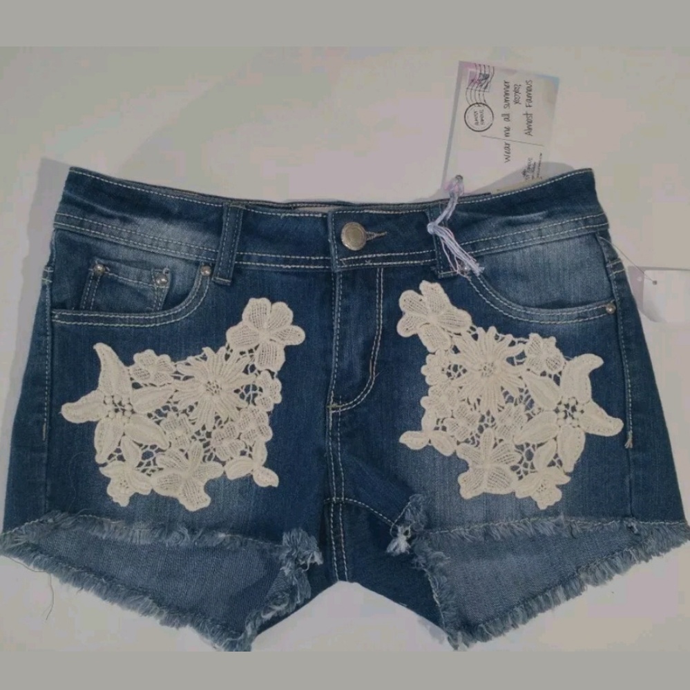 Almost famous shorts new with tags size 7 floral